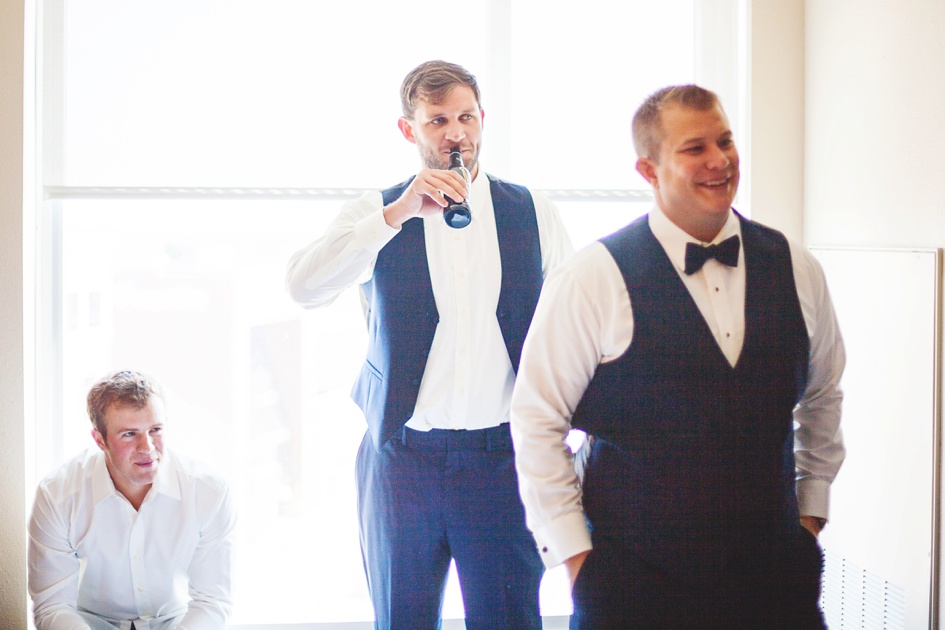 Groom and groomsmen getting ready for wedding by Rachael Schirano Photography