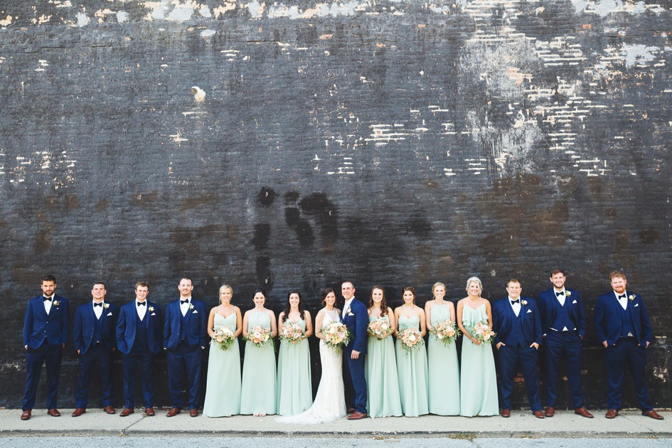 rustic Illinois summer wedding, Bridal party navy suits and mint green dresses on wedding day by Rachael Schirano Photography