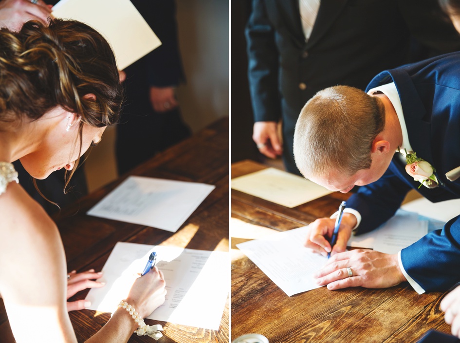 wedding day ceremony marriage license signing by Rachael Schirano Photography