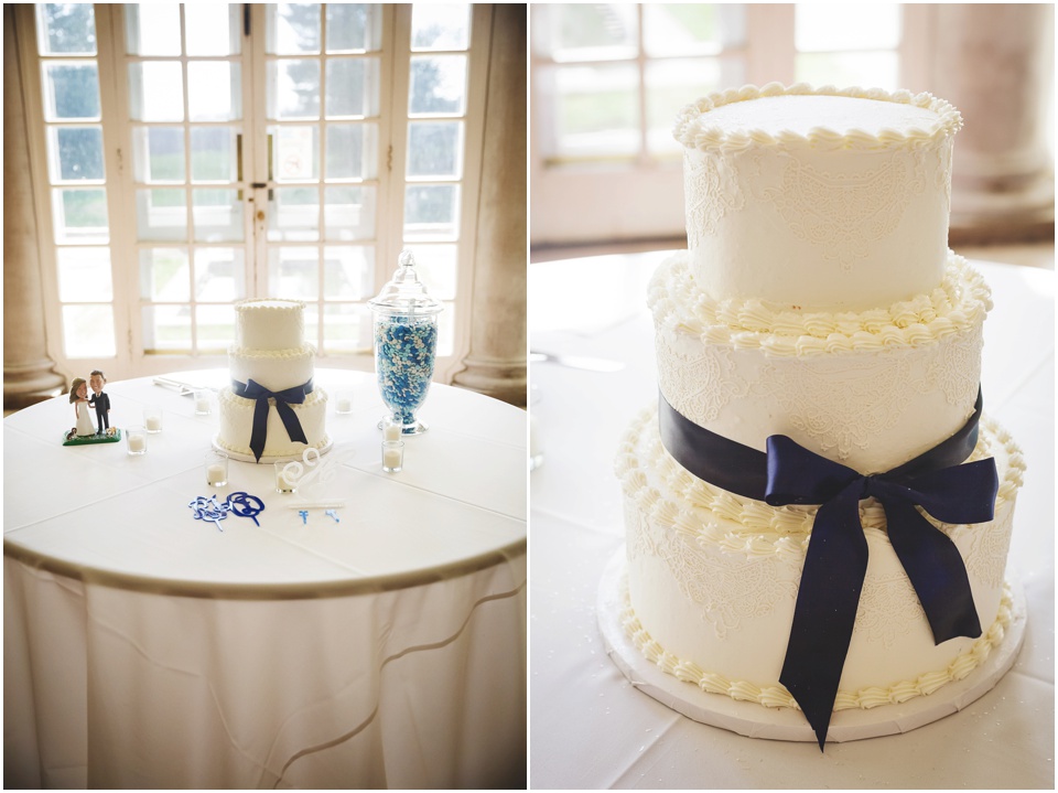 Allerton Park Wedding Cake with navy blue ribbon.