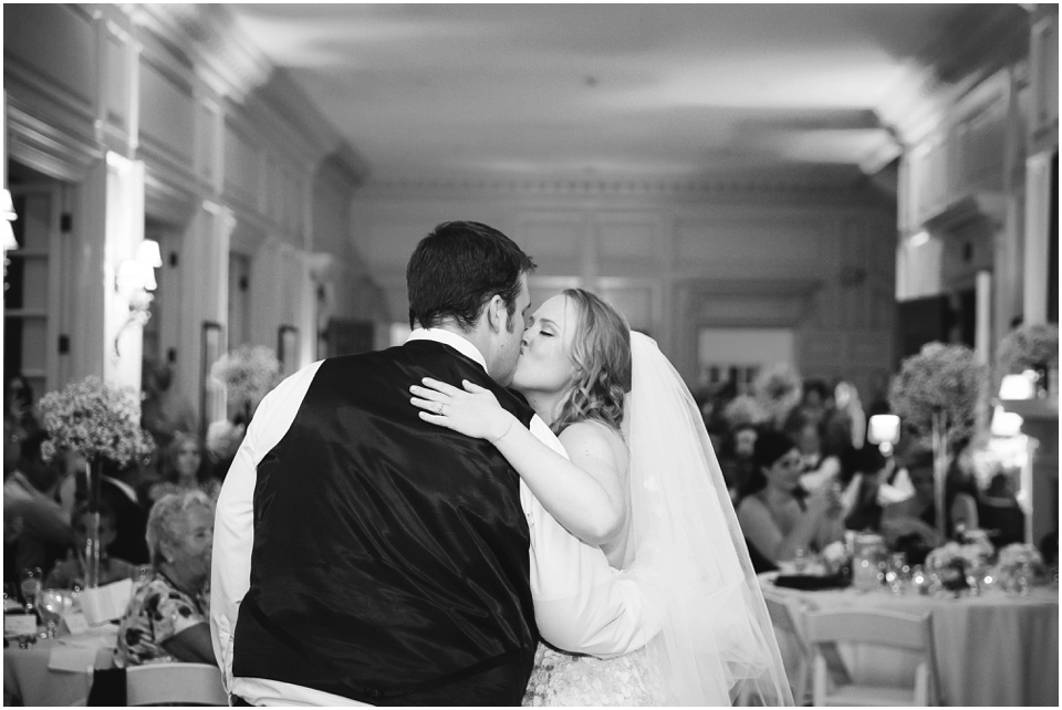 Bride and Groom first dance kiss at Bride and groom laughing during a toast at Allerton Park Mansion Wedding.