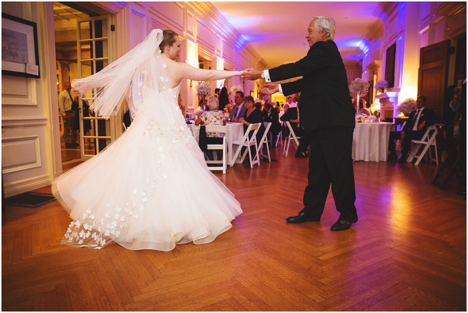 Father daughter dance bride twirling during Bride and Groom first dance at Bride and groom laughing during a toast at Allerton Park Mansion Wedding Reception.