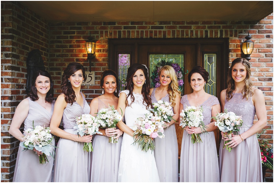 Bridesmaids in lavendar dresses.