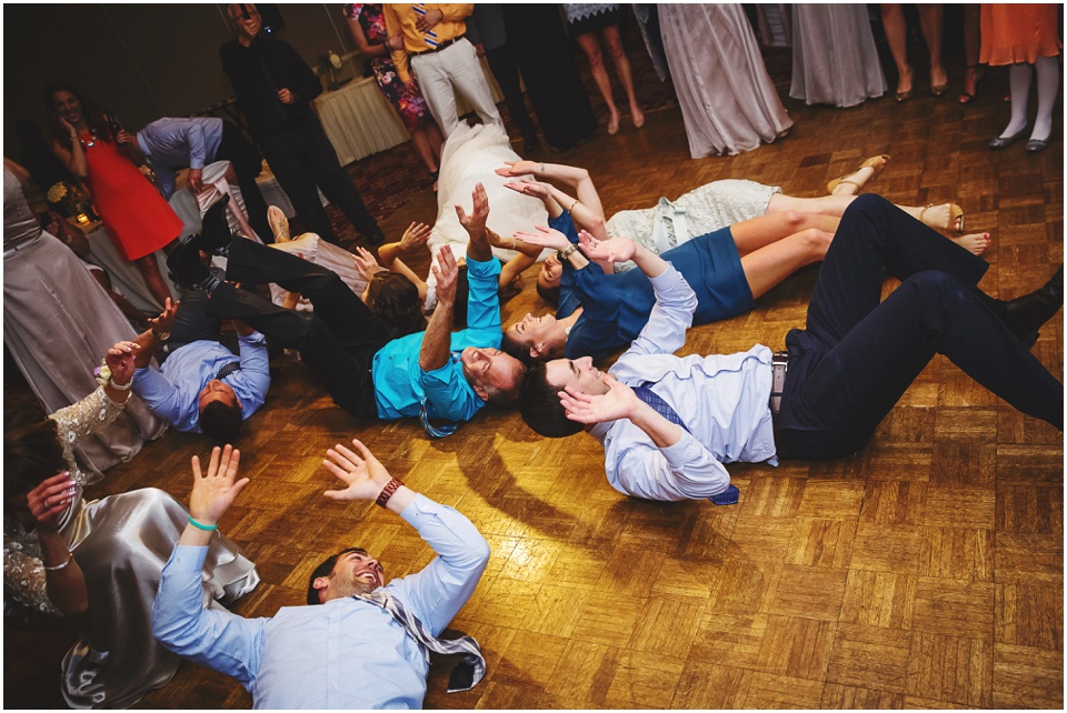 cathedral wedding photography, guests dancing and partying at wedding reception