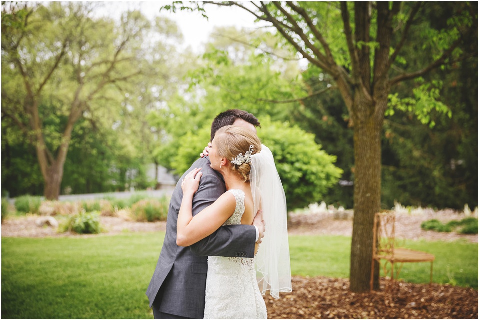 Bride and groom hugging at Kickapoo Creek Winery by Wedding Photographer Rachael Schirano