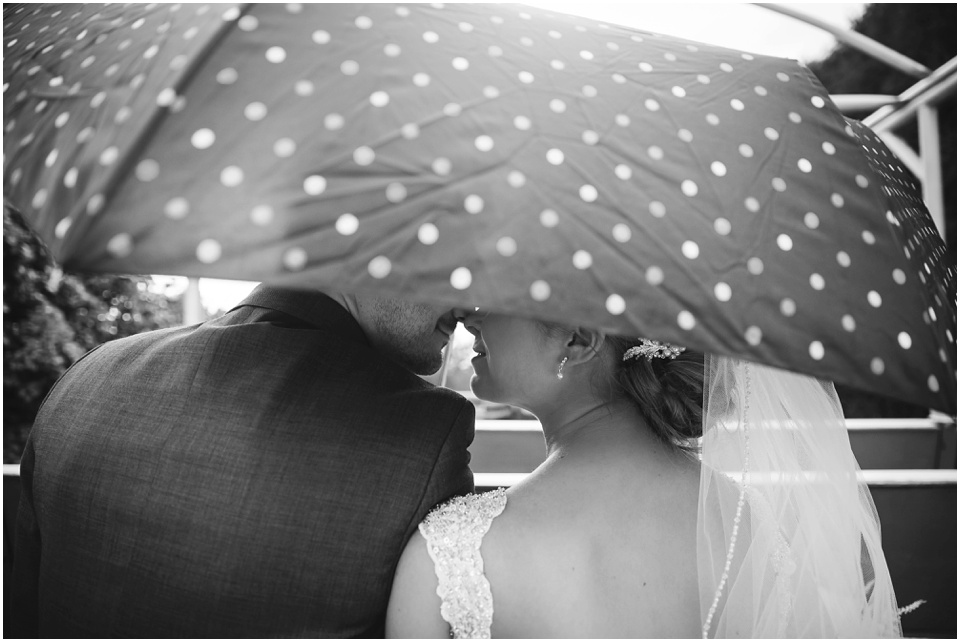 Rainy day wedding at Kickapoo Creek Winery by Wedding Photographer Rachael Schirano