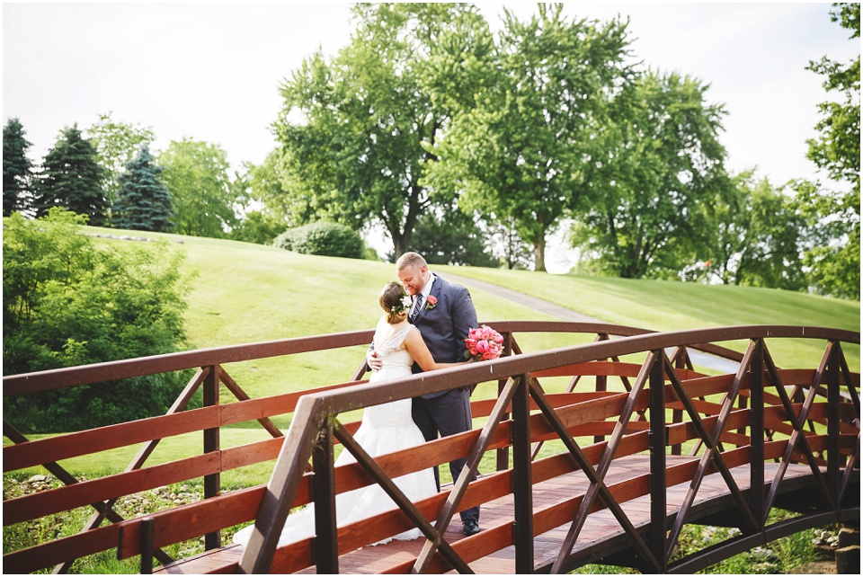 summer country club wedding photography, Bride and groom portraits on a bridge at Central Illinois Farm Wedding.