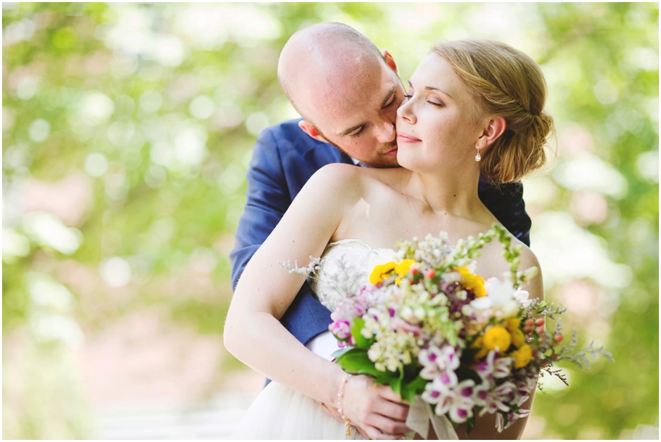 University of Illinois wedding photography, Bride and groom snuggling on wedding day