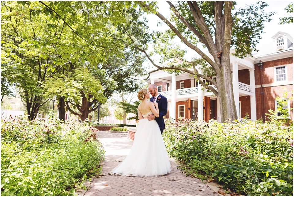 Bride and groom portraits at Central Illinois Mansion Wedding courtyard
