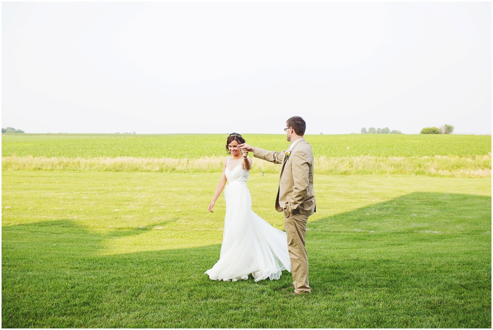 pear tree estates wedding photography, Bride and groom dancing in an open field.