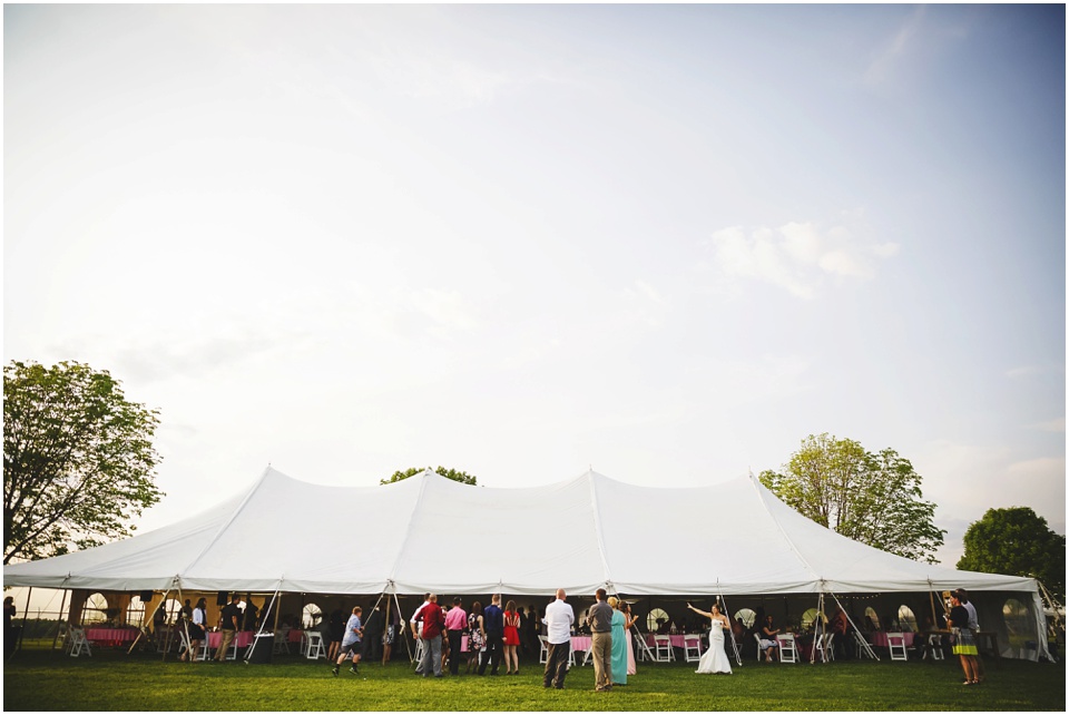 outdoor Illinois wedding photographer, Wedding Tent reception at Comlara Park Wedding Reception in Hudson, IL.