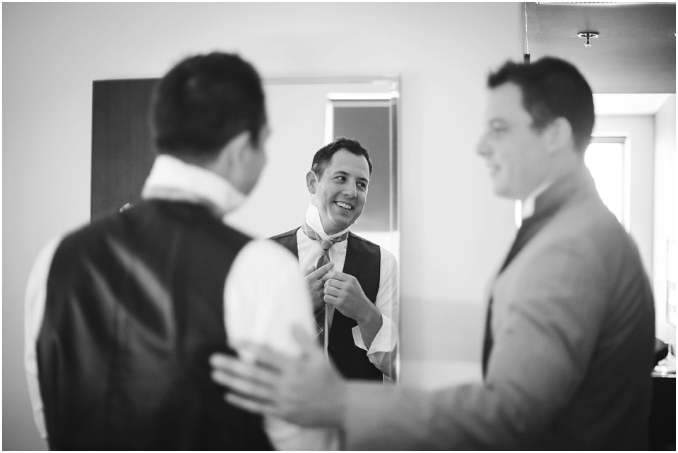 groom getting ready by Chicago Wedding Photographer Rachael Schirano