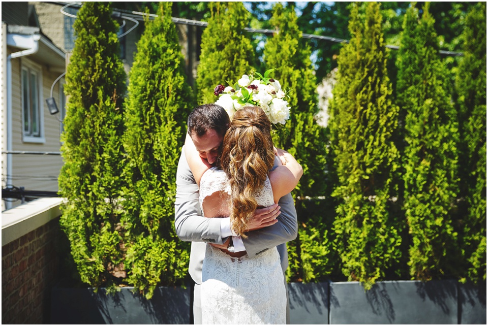 bride and groom chicago backyard first look by Chicago Wedding Photographer Rachael Schirano