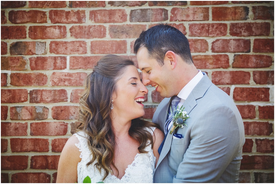 modern Chicago city wedding photography, bride and groom and a brick wall by Chicago Wedding Photographer Rachael Schirano