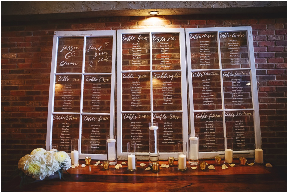 outdoor wedding photography, Hand-lettered seating chart window Bride and groom portraits by Bloomington Illinois Wedding Photographer Rachael Schirano