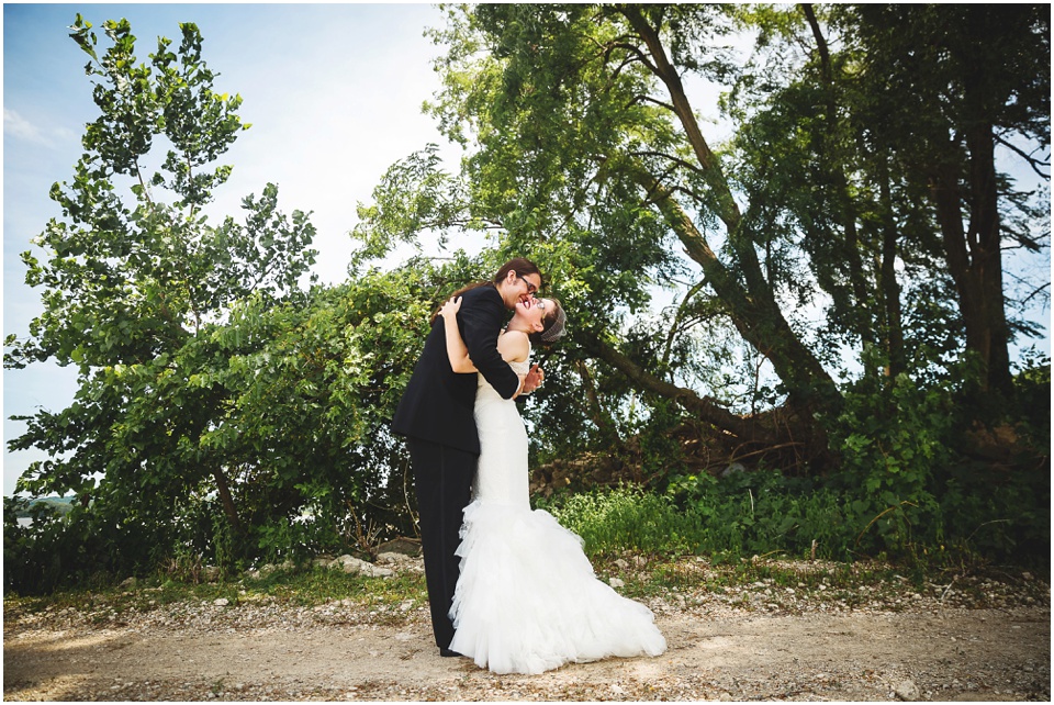 peoria illinois wedding photos,Bride and groom hug at Illinois Valley Yacht and Canoe Club Wedding