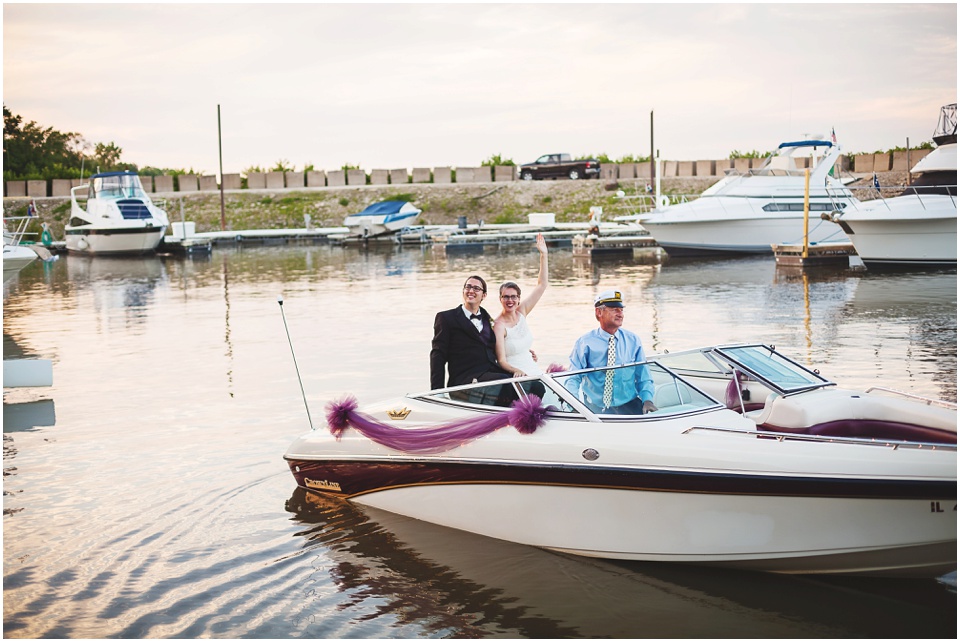 peoria illinois wedding photos,Bride and groom leave on a boat at Illinois Valley Yacht and Canoe Club Wedding