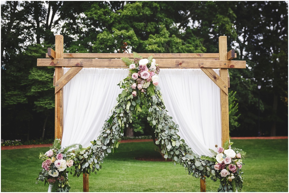 garden wedding photos, Wooden floral fabric ceremony backdrop for Central Illinois Wedding.