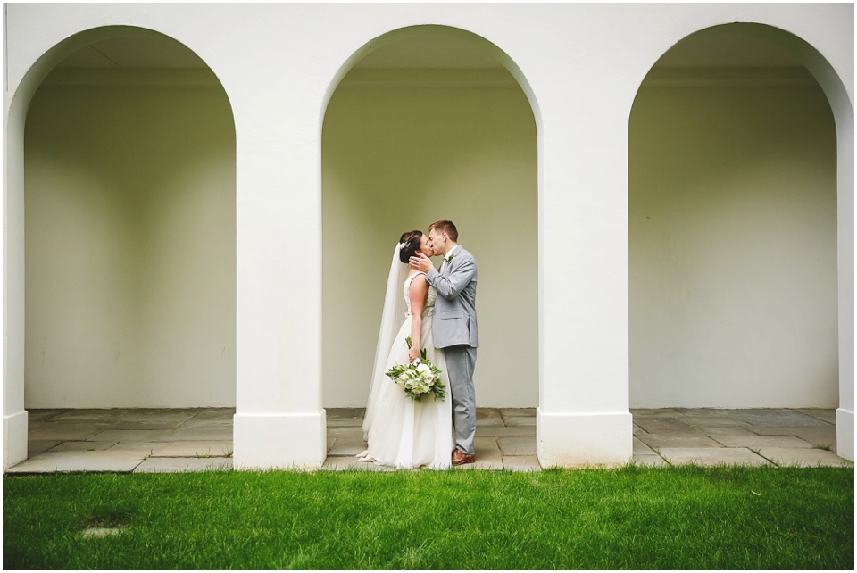 classic wedding photography, Bride and groom portraits in white arches at Central Illinois wedding