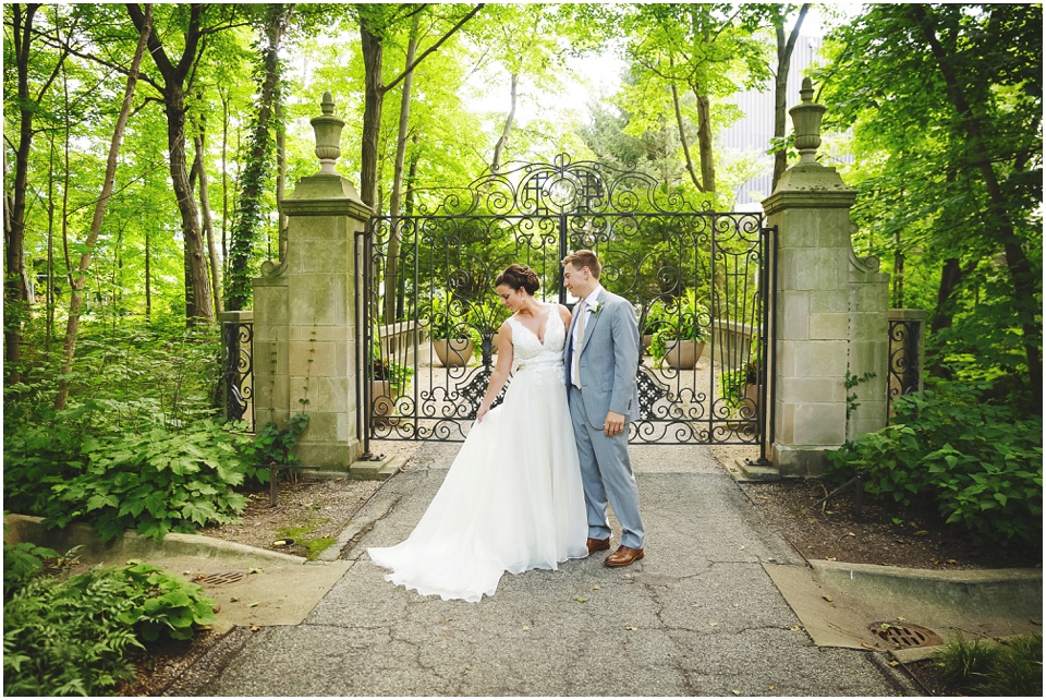 classic wedding photography, Bride and groom portraits at stone iron gate at Central Illinois wedding