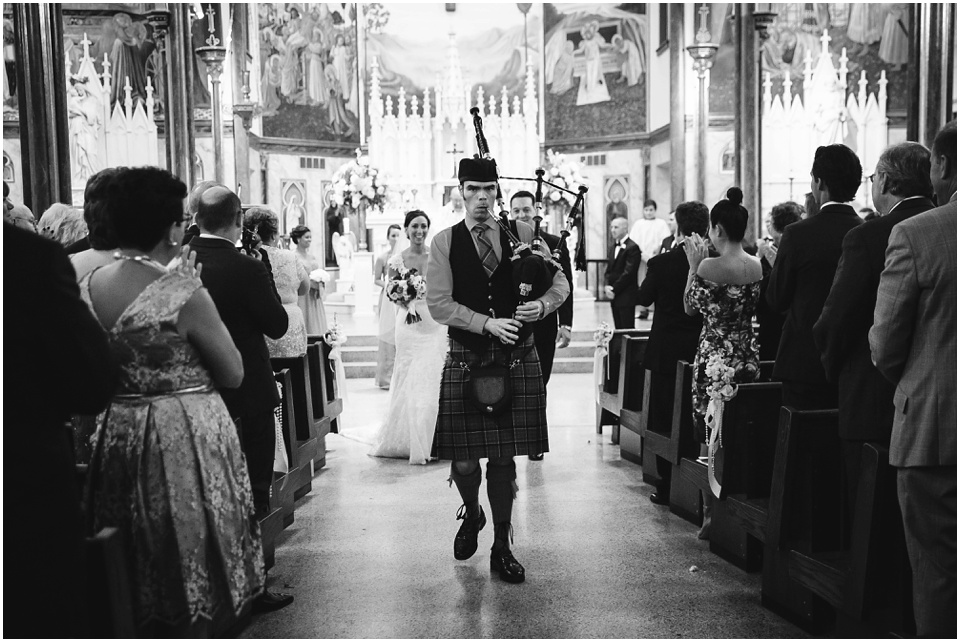 central illinois wedding photography, Bagpiper at Central Illinois purple and black cathedral wedding