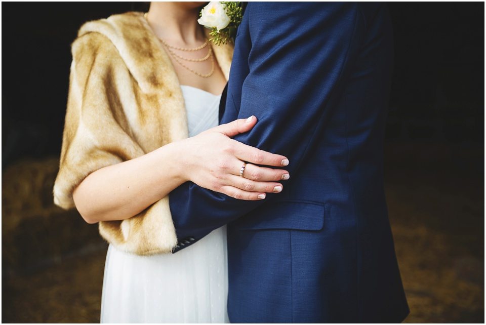 rustic winter wedding photography, Navy suit and tan fur brides coat at Winter Wedding in Central Illinois