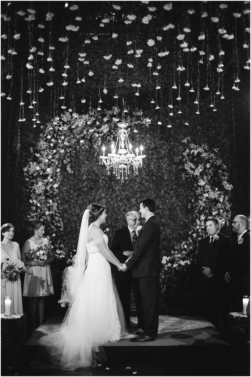central illinois wedding photographer, Bloomington Illinois Wedding Ceremony with grass wall and flowers hanging from ceiling by Rachael Schirano