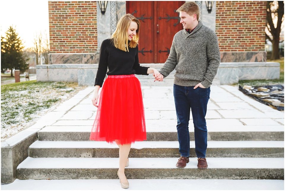 red and black Snowy city winter engagement in Central Illinois