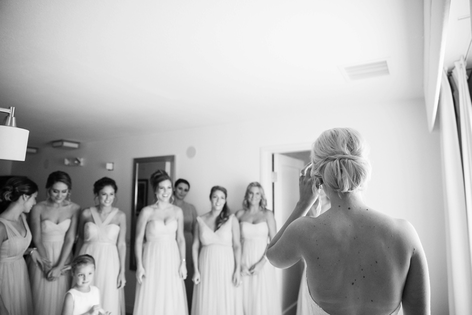 brides smile as they see bride for the first time