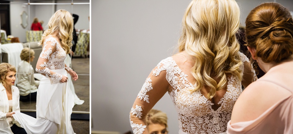 bride getting to lace long sleeve wedding dress