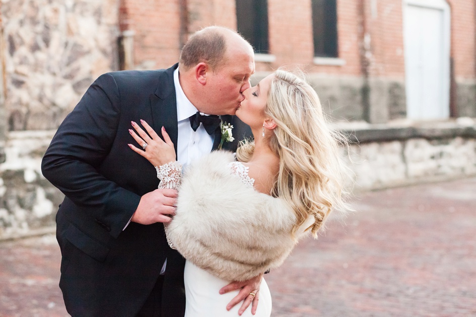 black and blush color industrial winter bride and groom photos with fur