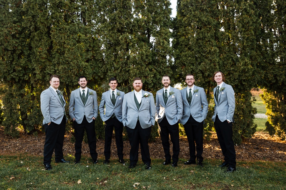 bridal party photos with tall pine trees