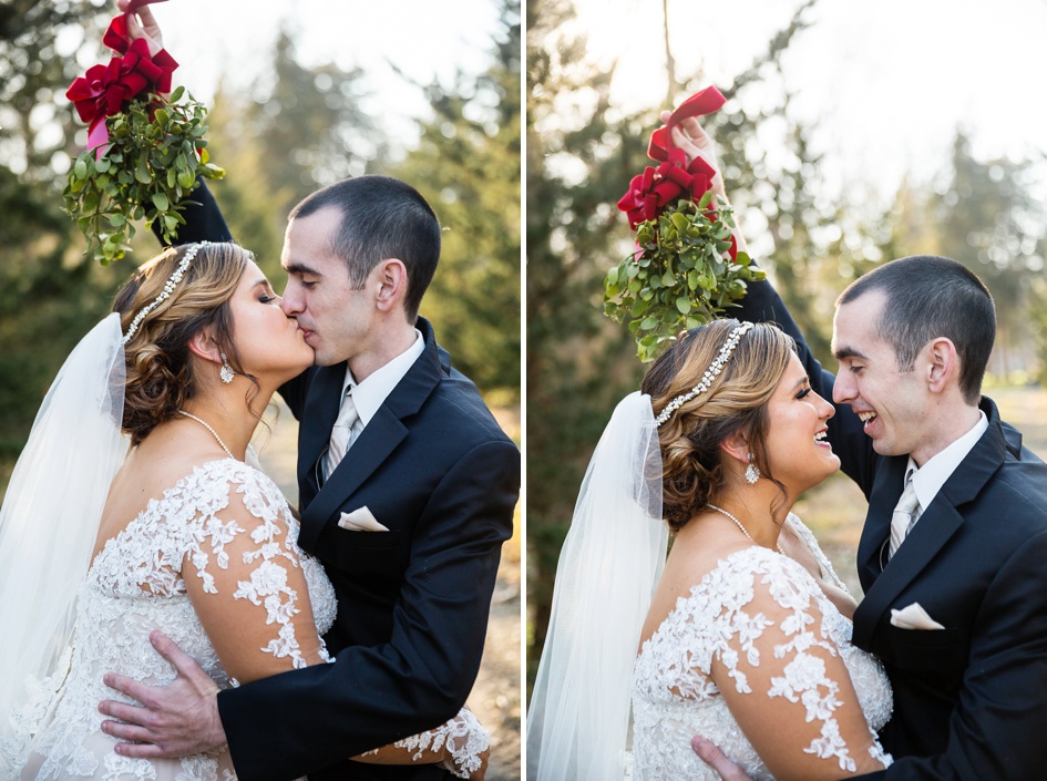 Bride and groom kiss under mistletoe at Allerton Park Wedding by Rachael Schirano Photographer