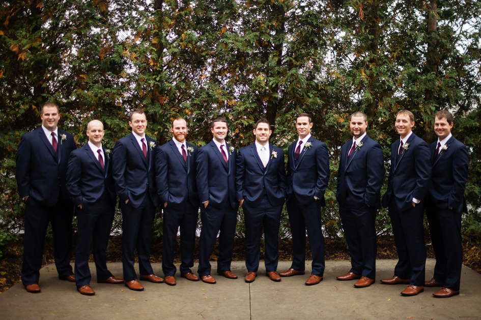 groom and groomsmen in navy suits
