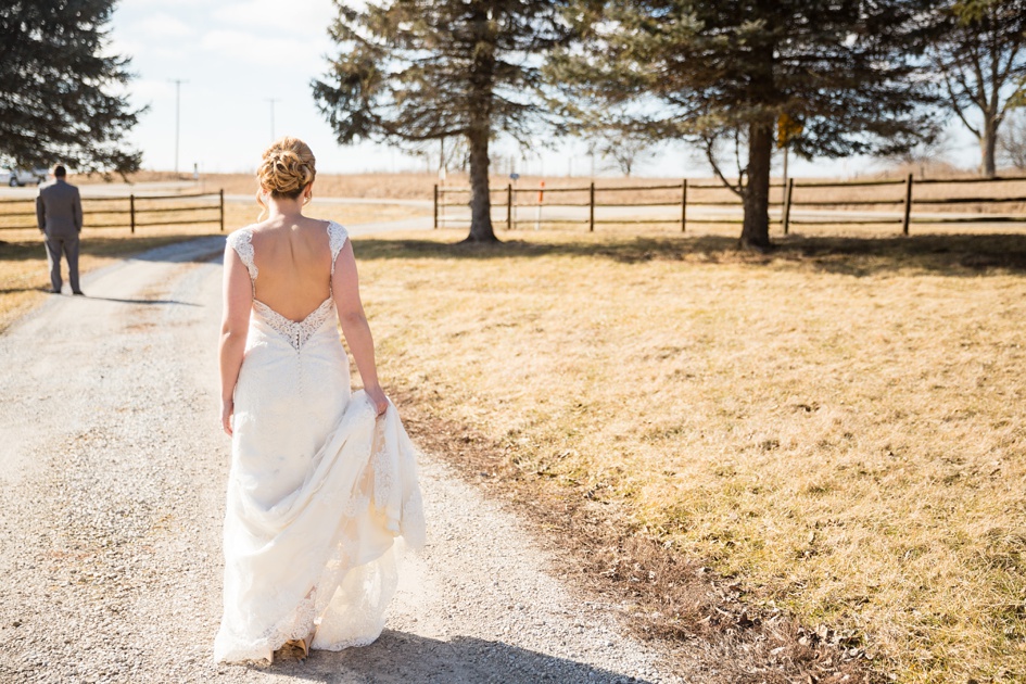 bride walking to first look