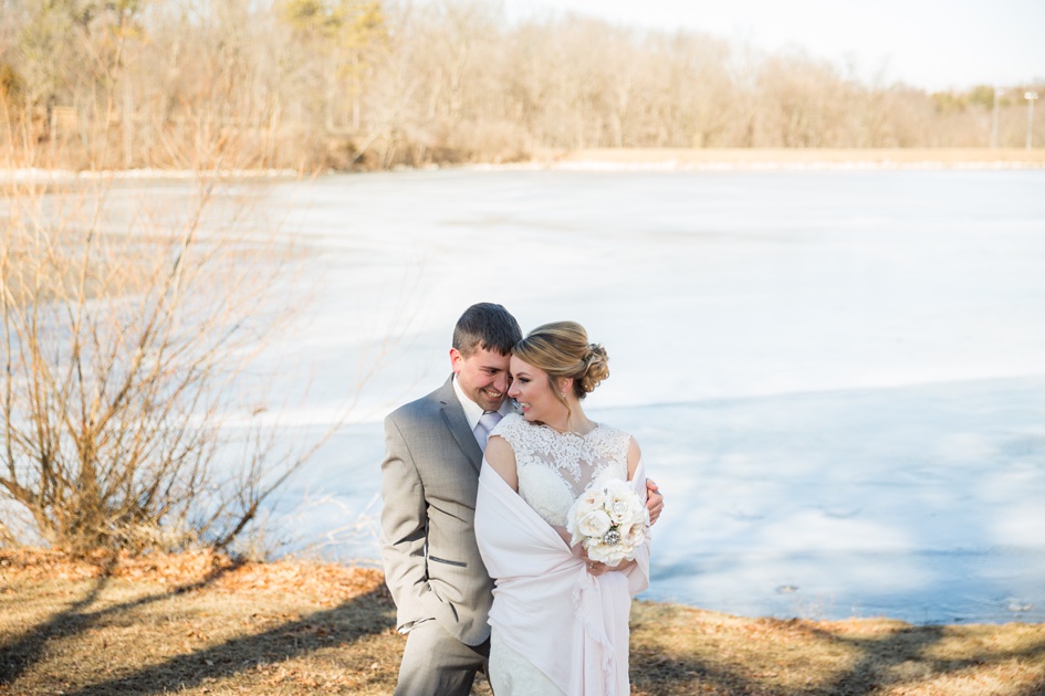 bride and groom winter lake portraits