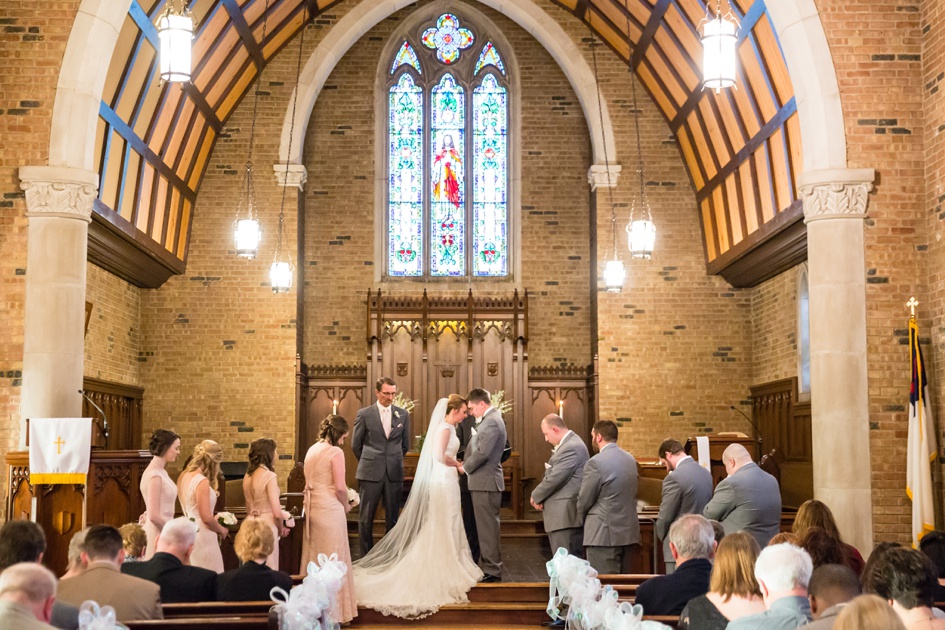 wooden arch church wedding ceremony