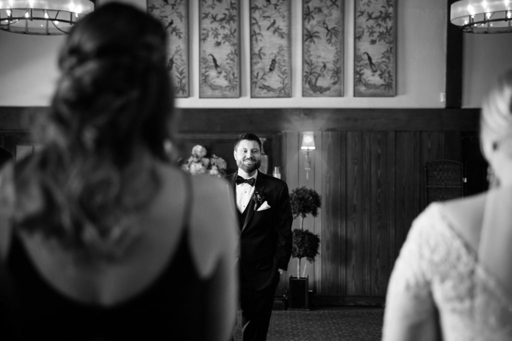Bloomington IL wedding photographer, Central Illinois wedding photographer, Peoria IL wedding photographer, Champaign IL wedding photographer, winter wedding, black tie wedding, black white and red wedding colors, bride and groom first look