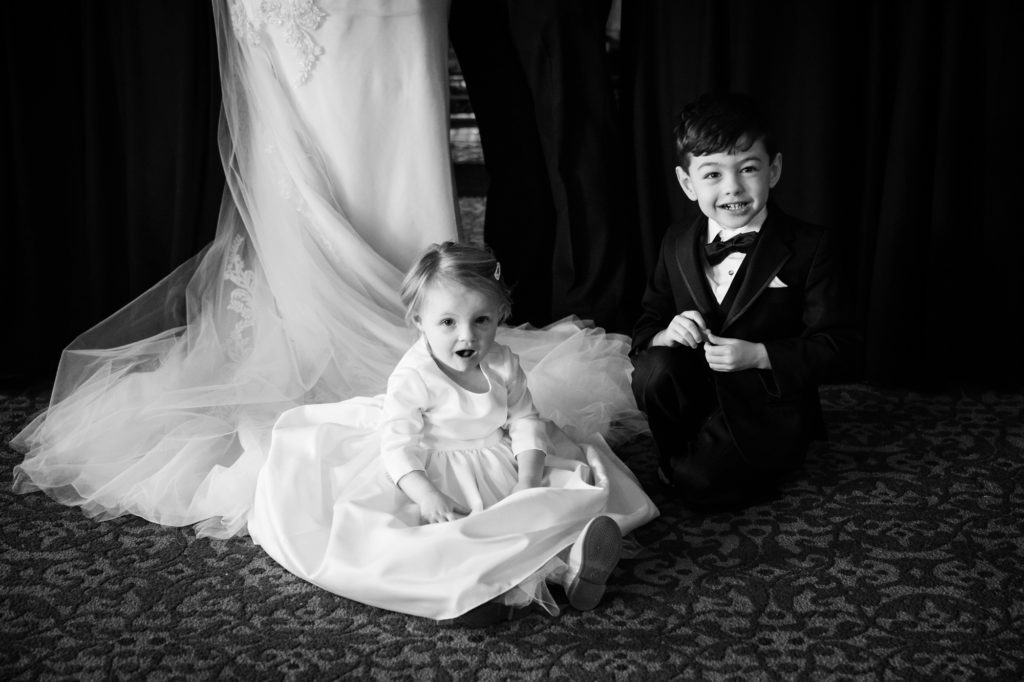 Bloomington IL wedding photographer, Central Illinois wedding photographer, Peoria IL wedding photographer, Champaign IL wedding photographer, winter wedding, black tie wedding, black white and red wedding colors, bride and groom portraits, indoor bridal portraits, indoor wedding party portraits, indoor bridal party portraits, flower girl and ring bearer