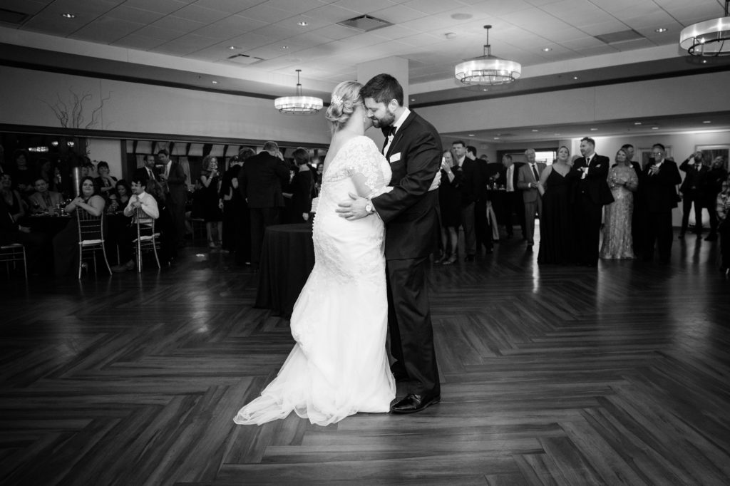 Bloomington IL wedding photographer, Central Illinois wedding photographer, Peoria IL wedding photographer, Champaign IL wedding photographer, winter wedding, black tie wedding, black white and red wedding colors, wedding reception, bride and groom first dance
