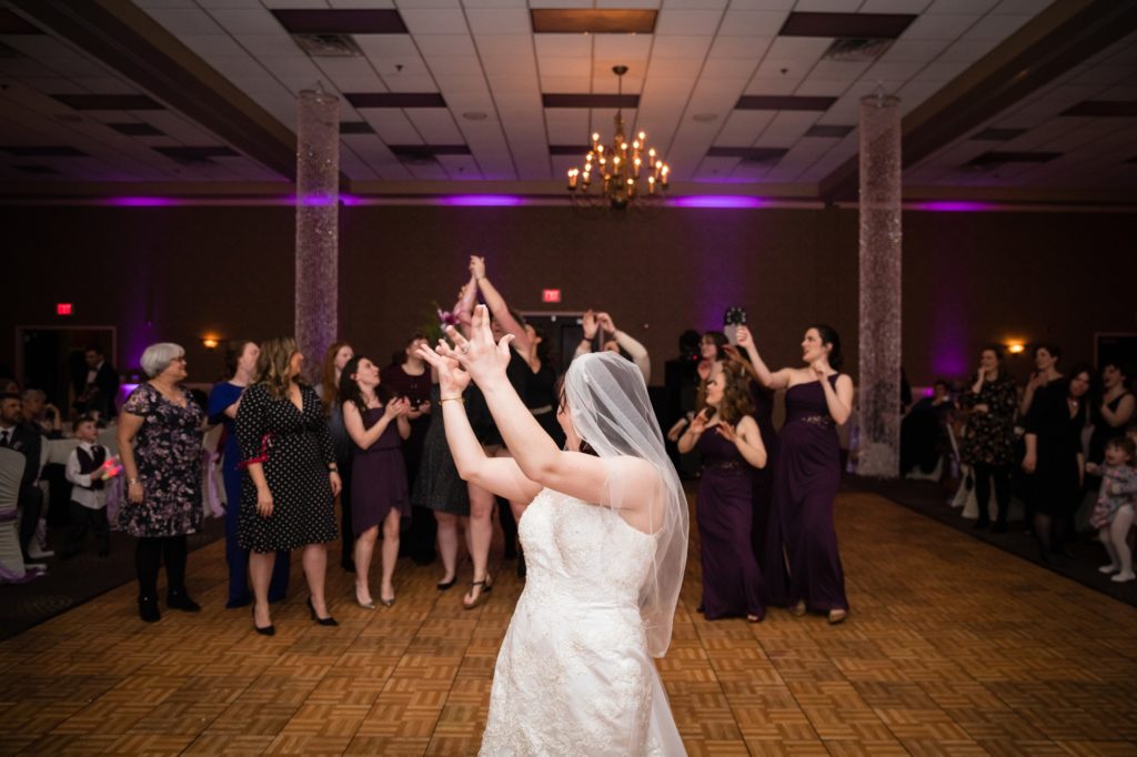 Bloomington IL wedding photographer, Central Illinois wedding photographer, Peoria IL wedding photographer, Champaign IL wedding photographer, winter wedding, grey white and purple wedding colors, glow stick wedding reception, bouquet toss