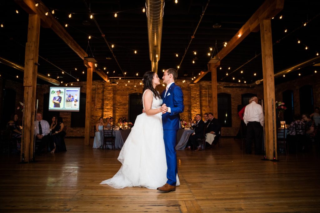 Bloomington IL wedding photographer, Central Illinois wedding photographer, Peoria IL wedding photographer, Champaign IL wedding photographer, royal and baby blue wedding colors, industrial wedding reception, blue and gold reception details, dancing