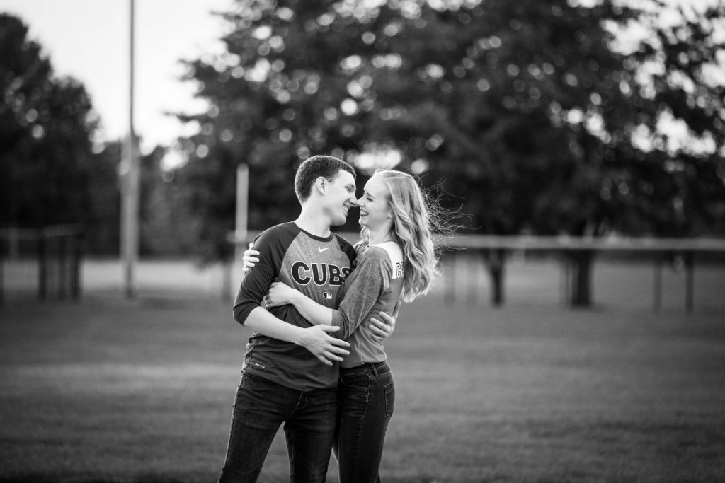 Bloomington IL engagement session, Central Illinois engagement photographer, what to wear for your engagement session, couple's portraits, engaged couple, outdoor engagement, formal engagement photos, baseball engagement session, sports teams engagement outfits