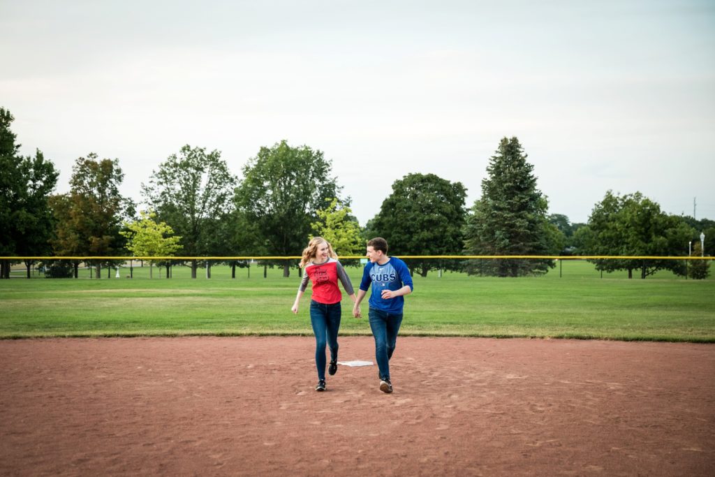 Bloomington IL engagement session, Central Illinois engagement photographer, what to wear for your engagement session, couple's portraits, engaged couple, outdoor engagement, formal engagement photos, baseball engagement session, sports teams engagement outfits