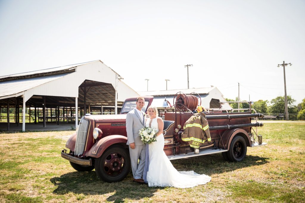 Bloomington IL wedding photographer, Central Illinois wedding photographer, Peoria IL wedding photographer, Champaign IL wedding photographer, farm wedding, rustic wedding, blue and grey wedding colors, bride and groom photos with old fire truck